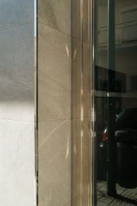 Kaboompics - Neutral Stone Facade and Glass Door Detail