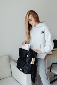 Kaboompics - Teenage Girl Preparing School Backpack at Home