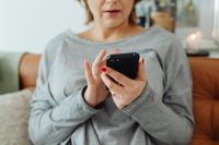 Kaboompics - Woman Using Smartphone for Cryptocurrency