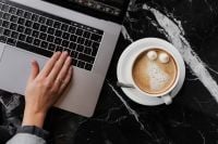 Kaboompics - Coffee & Laptop on Marble Table – Home Office Workspace Background