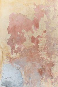 Kaboompics - Peeling Ochre Plaster over Concrete