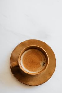 Kaboompics - Brown Coffee Cup and Saucer, Top-Down View
