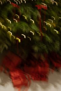Kaboompics - Abstract Golden Light Trails and Red Ribbons on Christmas Tree