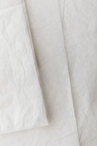 Kaboompics - Stacked Paper Texture Soft Light Neutral Background