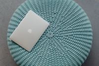 Kaboompics - MacBook Laptop on a blue pouf