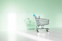 Kaboompics - Shopping Cart with Soft Shadow on Mint Green E-Commerce Background