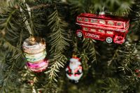 Kaboompics - Red London Bus and Santa Ornaments with Colorful Macaron