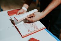 Kaboompics - Red book on a white table