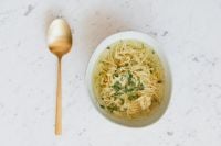 Kaboompics - Polish Rosół with Gold Spoon, Overhead Homemade Soup Food Styling