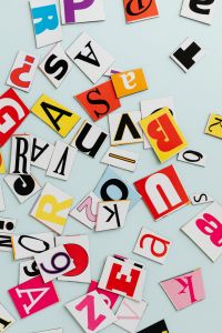 Kaboompics - Dense Colorful Alphabet Letter Collage on Pale Blue
