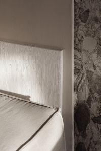 Kaboompics - Beige Wall with Grooved White Panel and Stone Edge