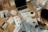 Kaboompics - Overhead Interior Design Moodboard with Laptop, Coffee and Material Samples