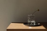 Kaboompics - Glass cube vase with craspedia on oak shelf