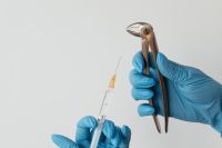Kaboompics - Dental Local Anesthesia Syringe and Extraction Forceps