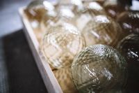 Kaboompics - Macro Close-Up of Textured Clear Glass Spheres on Display