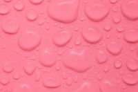 Kaboompics - Coral Pink Liquid Background With Large Water Drops