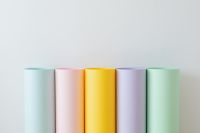 Kaboompics - Five Pastel Paper Rolls Against a White Background