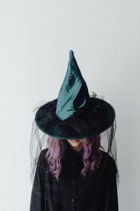 Kaboompics - Woman in Witch Costume with Teal Witch Hat