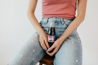 Kaboompics - Young woman with Pepsi Cola bottle