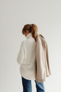 Kaboompics - Rear View of Faceless Woman in White Knit Sweater with Beige Coat, Minimal Neutral Fashion Portrait