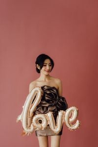 Kaboompics - Woman in Satin Dress With LOVE Balloons