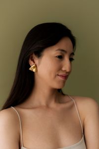 Kaboompics - Close Up of Woman Wearing Gold Earrings