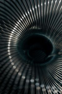 Kaboompics - Abstract Silver Coil Spiral with Dark Center