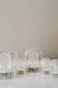 Kaboompics - Clear Glass Dome Ornaments on Neutral Surface