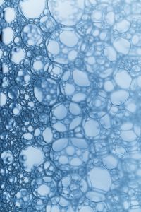 Kaboompics - Light Blue Soap Bubble Texture Vertical