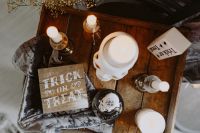 Kaboompics - Halloween Trick or Treat Flat Lay with Skull Decor and Candles