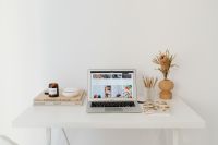 Kaboompics - Minimal White Home Office Desk with Laptop and Dried Flowers