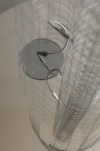 Kaboompics - Minimalist Architectural Background with Wire Grid and Curved Lamp
