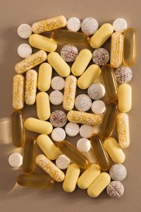 Kaboompics - Large Assortment of Vitamins and Capsules on Beige
