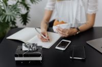Kaboompics - Workplace Lunch Setup With Notebook, Phone and Laptop
