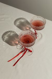 Kaboompics - Red Cocktails, Heart Cake and Dried Flowers in Sunlight