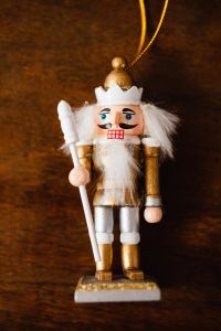 Kaboompics - Traditional Nutcracker Christmas Ornament on Brown Wood
