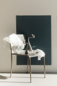 Kaboompics - Chrome Chair With White Fabric and Metal Object