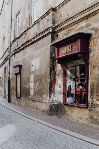 Kaboompics - Cafe Corner and Weathered Stone Facade in Krakow