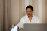 Kaboompics - Black Woman Working Remotely on Laptop