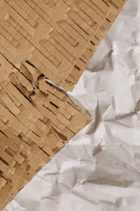Kaboompics - Torn Folded Brown Paper over Crumpled White Paper