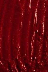Kaboompics - Deep Red Lipstick Texture with Vertical Highlights