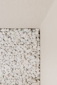 Kaboompics - Minimal Beige Paving Tile with Recessed White Pebble Inlay