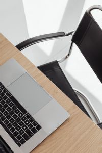 Kaboompics - MacBook on Oak Desk in Bright Minimal Home Office