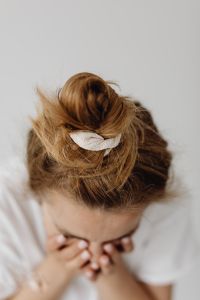 Kaboompics - Messy Bun Secured with a White Fabric Scrunchie