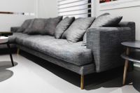Kaboompics - Grey long sofa with pillows