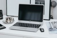 Kaboompics - Laptop computer on white desk