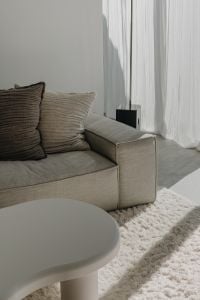 Kaboompics - Neutral Living Room with Beige Sofa and Round Coffee Table