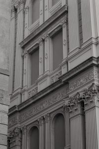 Kaboompics - Black and White Study of Classical Stone Columns and Molding