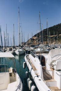 Kaboompics - Sailboat Masts Against Mediterranean Hillside