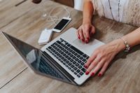 Kaboompics - Woman working on a computer